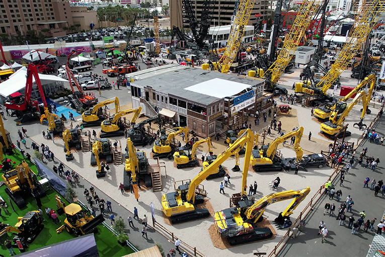 Aerial view of KOBELCO booth and multiple machines lined up at ConExpo